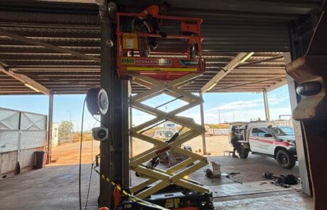 Technician wiring a replacement roller shutter motor in Port Hedland