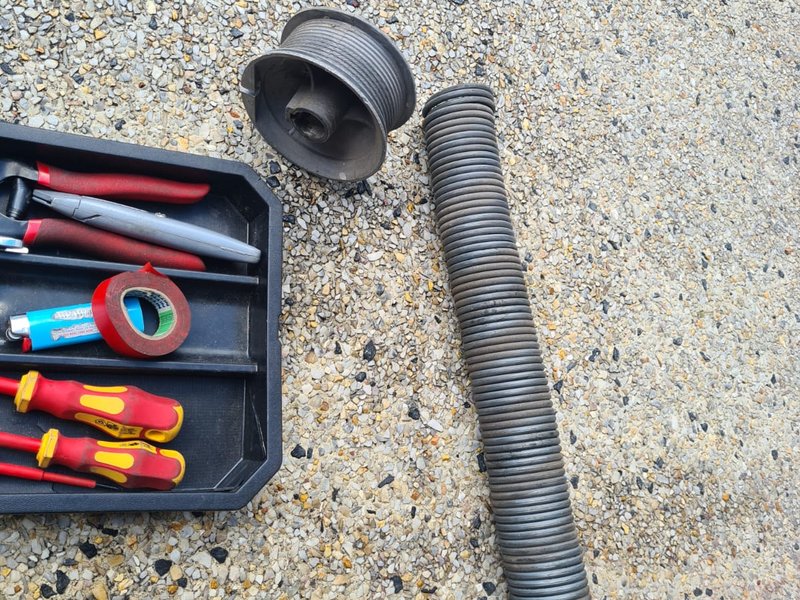 Roller door torsion spring and cable drum